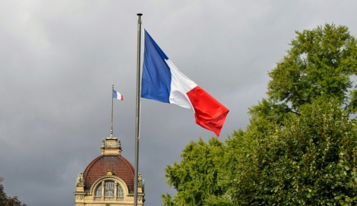 a French flag on builing in Strasbourg, France                     