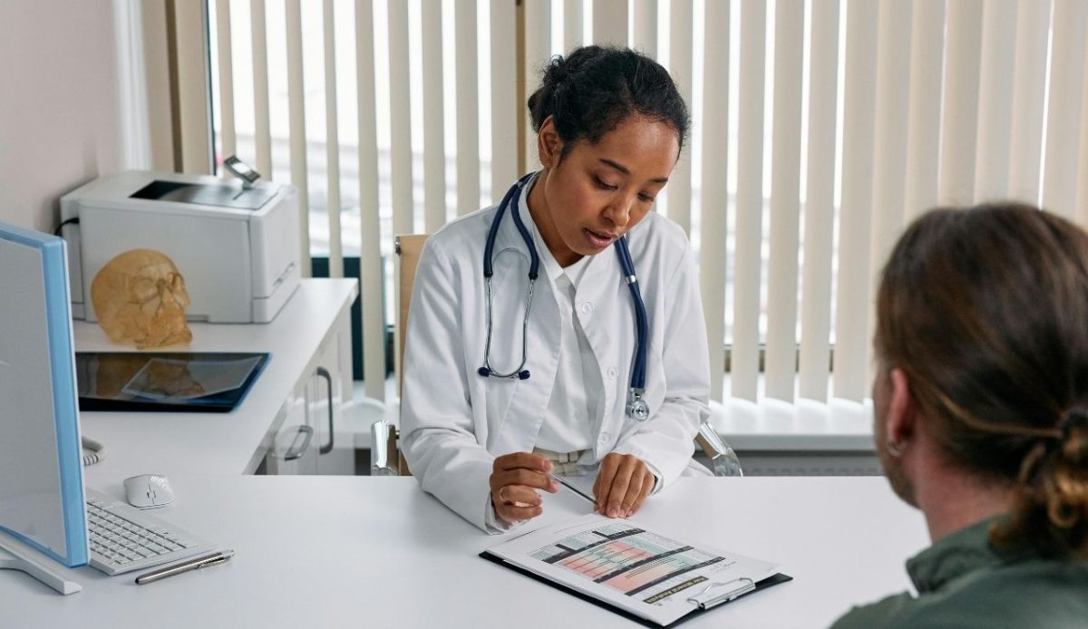 A doctor is talking with the patient                