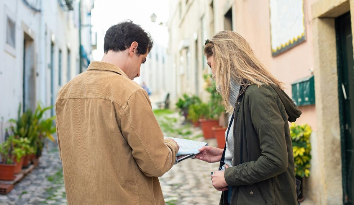 couple is viewing map 