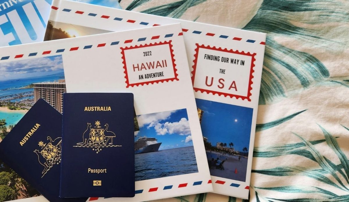 passports displayed with cruise travel guides and destination journals             