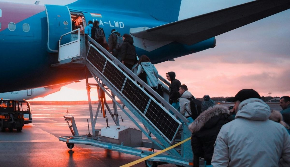 Photo of People Boarding on airline       