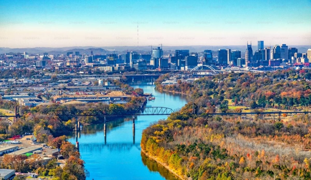 Aerial view of Durham skyline with the Eno River and autumn trees, North Carolina                                 