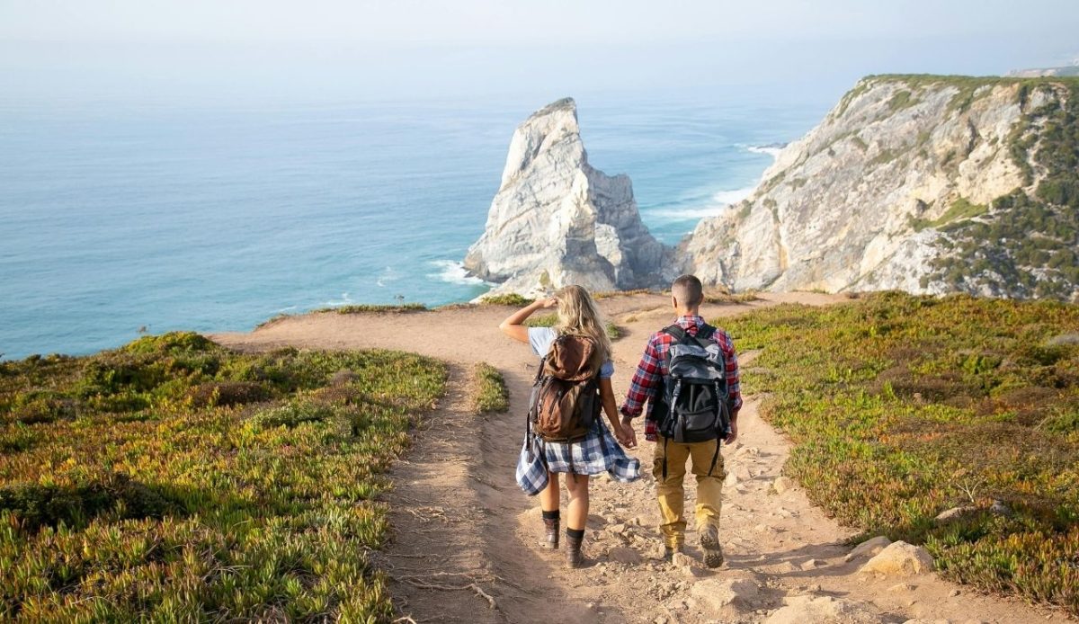 Couple Walking near Sea
