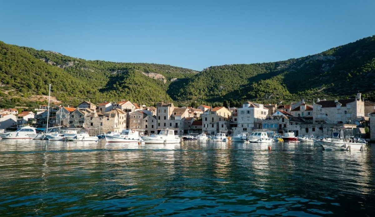 Fishing village of Komiža, located on the island of Vis in Croatia                                  