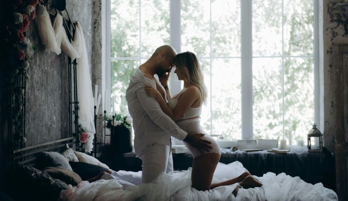 Man and Woman in romantic mood inside room                        
