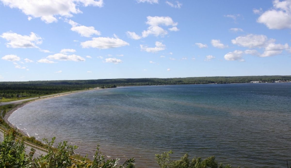 Keweenaw Bay. wU.S. Route 41 is visible along the shoreline.                            
