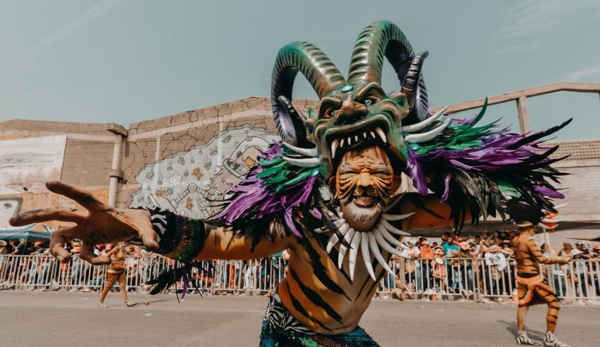 Man Celebrating Dominican Republic Carnival Wearing Mask and Costume of the Diablo Cojuelo, Carribean
