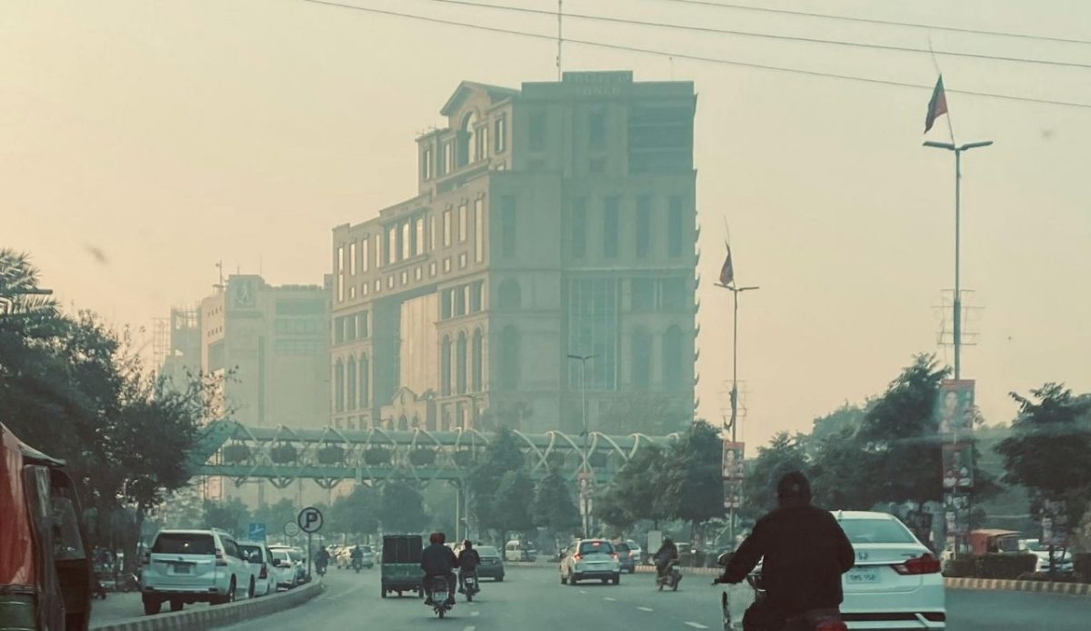 The World’s 10 Most Polluted Cities for Travelers to Know 2 Morning traffic on a hazy boulevard near the historic Quaid-e-Azam Library in Lahore, Pakistan