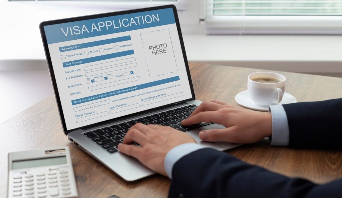 Visa application online form on laptop                            