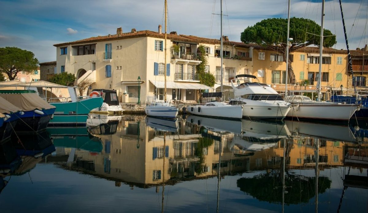White ships docked at Port Grimaud, Grimaud, France                         