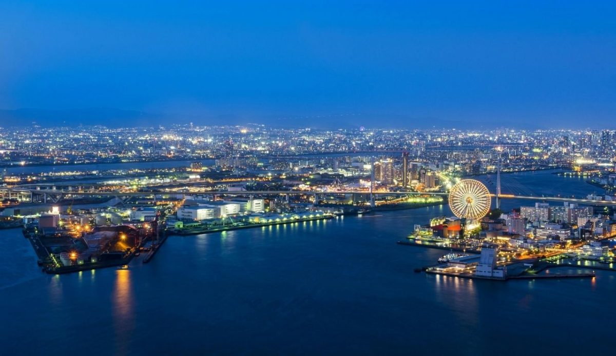 Night view of Osaka Bay with city lights and Ferris wheel, Osaka, Japan