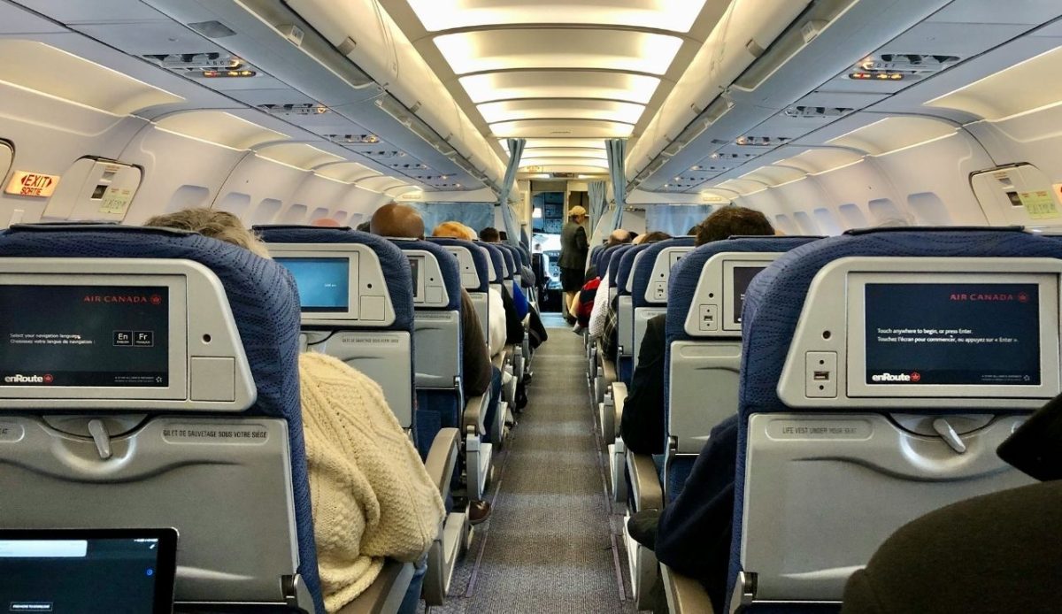 inside picture of an airplane with showing seats                               