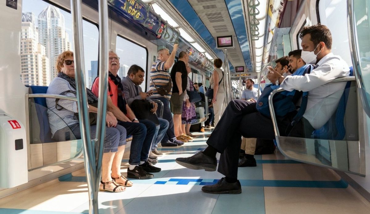 passengers sitting in metro Dubai - United Arab Emirates                         