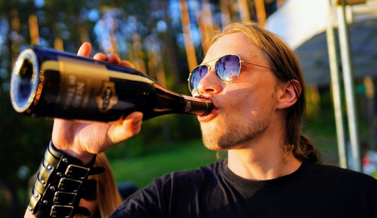 drinking alcohol in outside near camp           