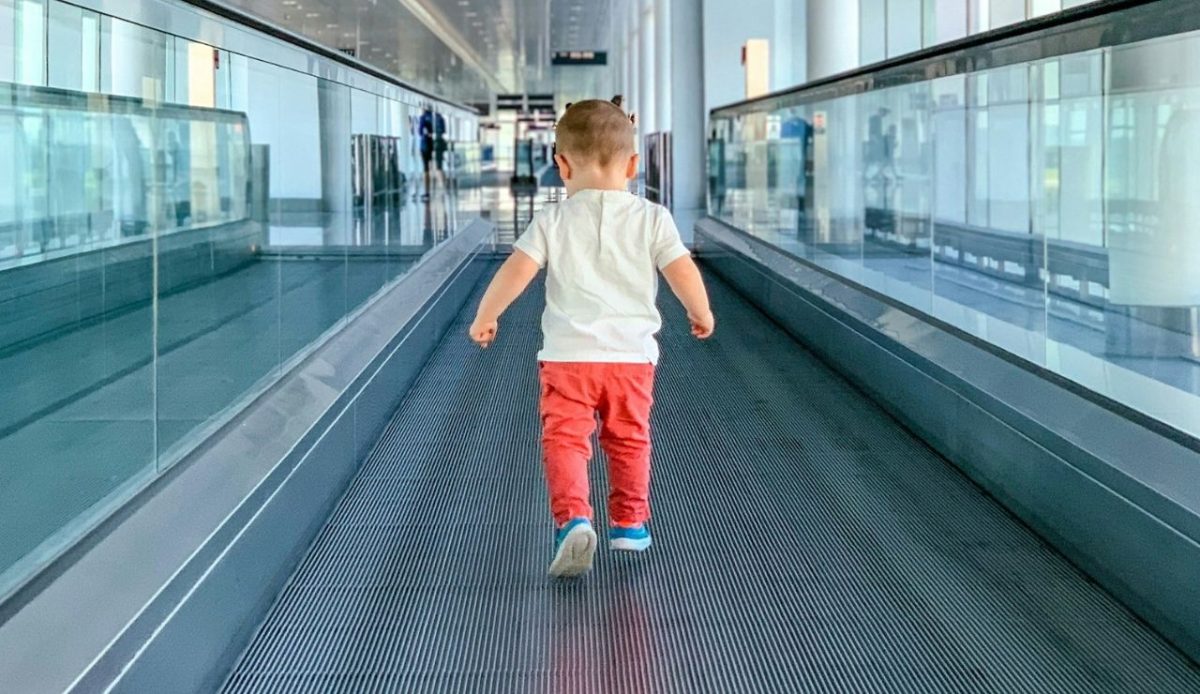 A child running at the airport                   