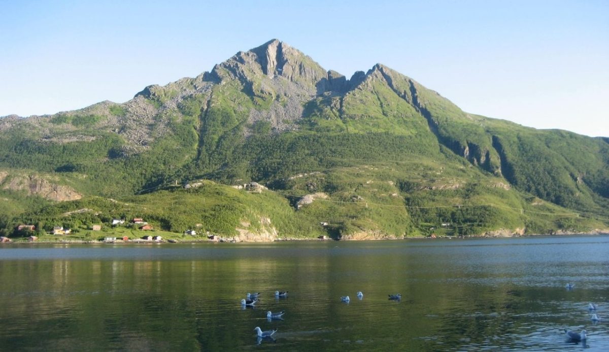 Okstinden mountain in municipality of Lurøy, Helgeland Region, Norway                       