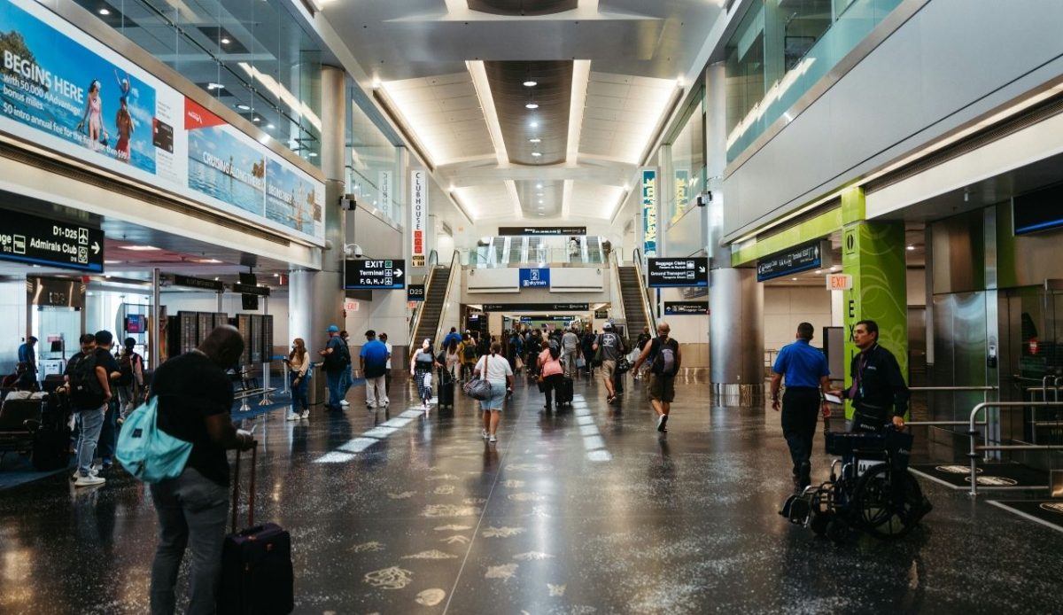 travelers at Miami airport, Florida, USA                      