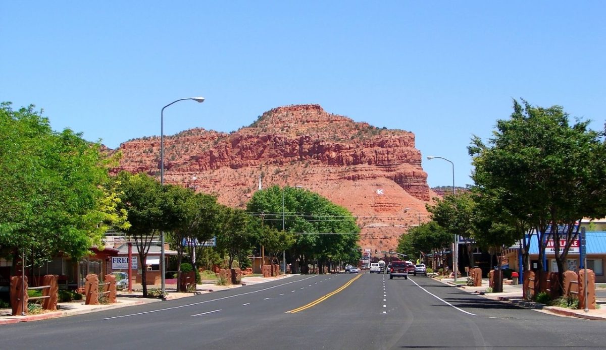 View of downtown Kanab with red sandstone cliffs in the background, Utah, United States 