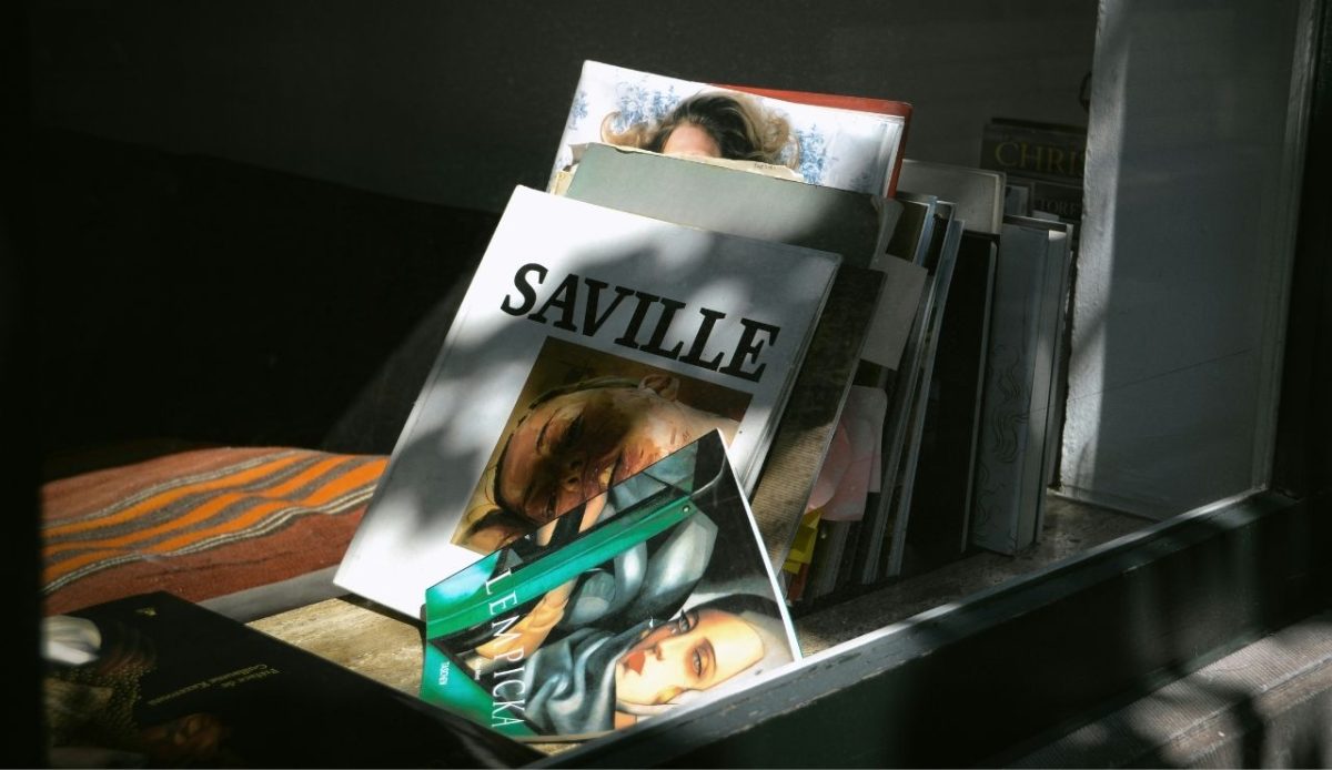books and magzines lying on a table                                  