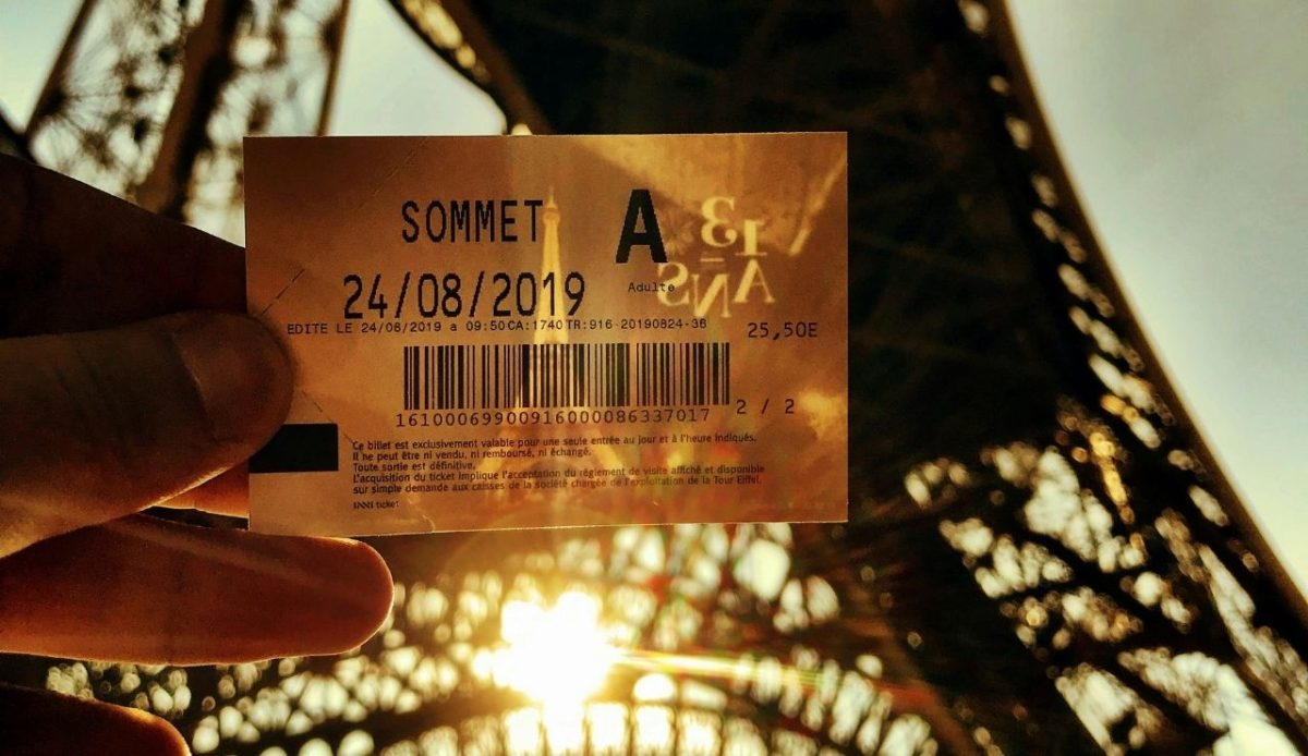 person holding ticket                     