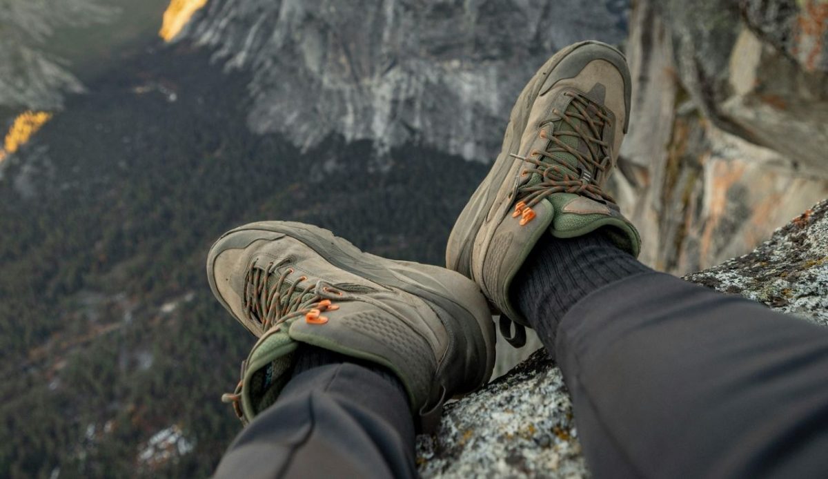 person with bulky camp shoes                         