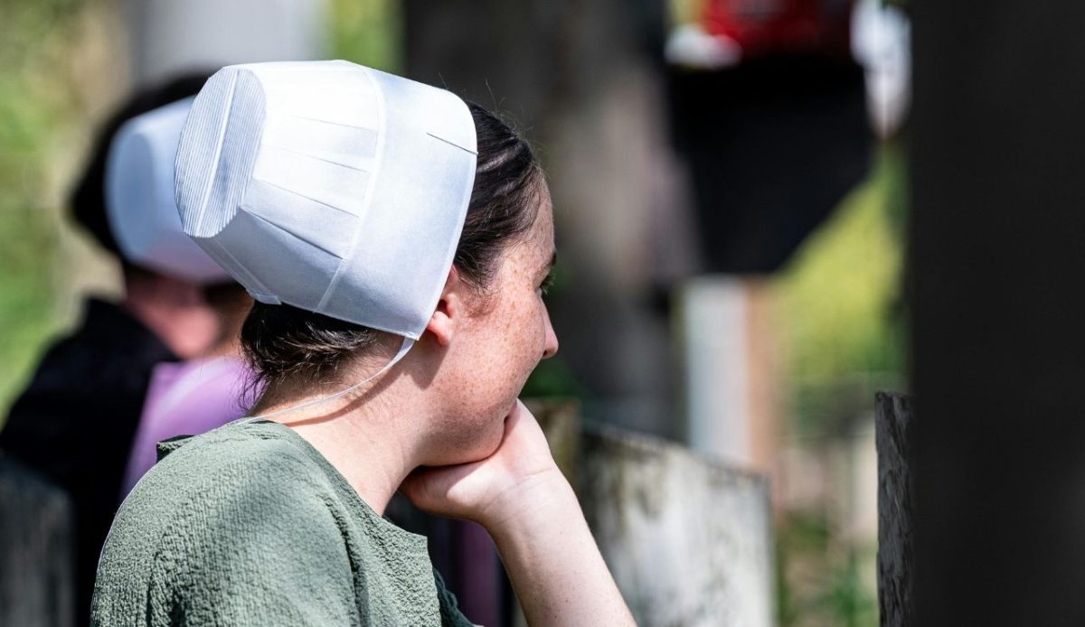 woman wearing amish cap posing                   