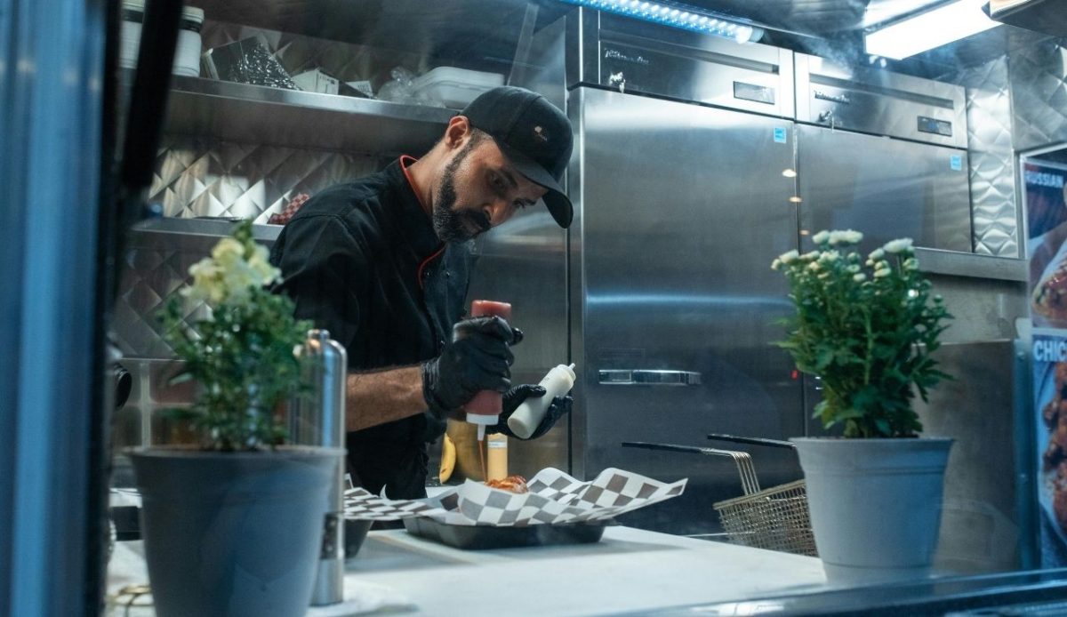 A Man Preparing Food at the Table                                
