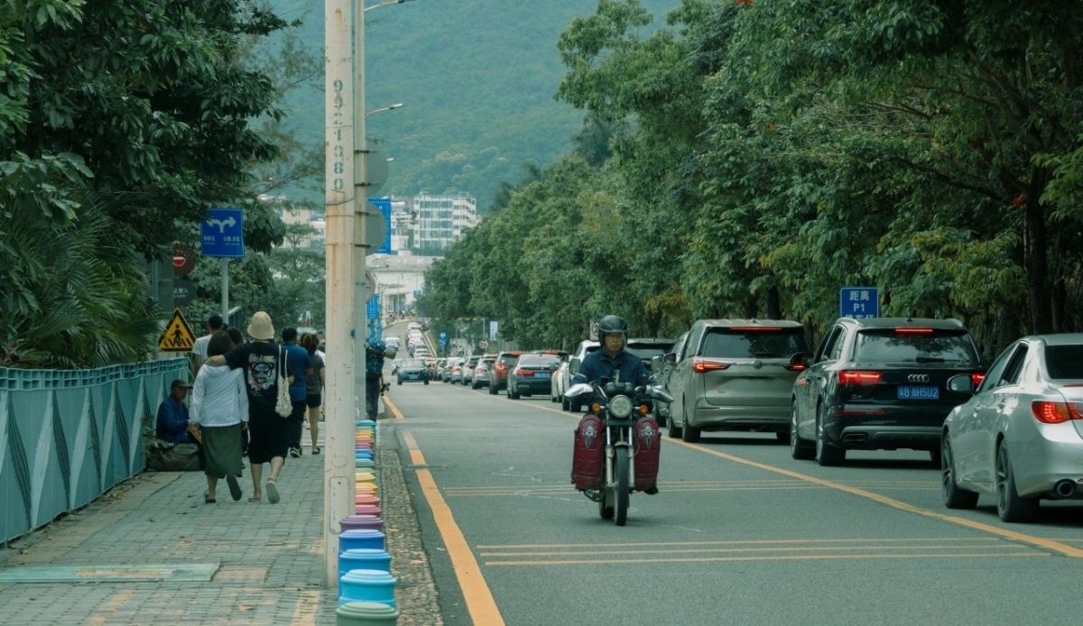 A street with a lot of colorful poles                                  