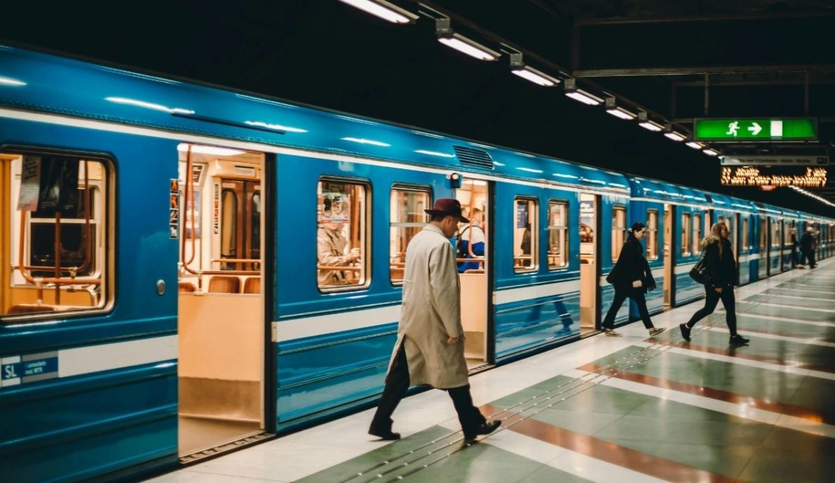 Metro station with passengers on platform                                 