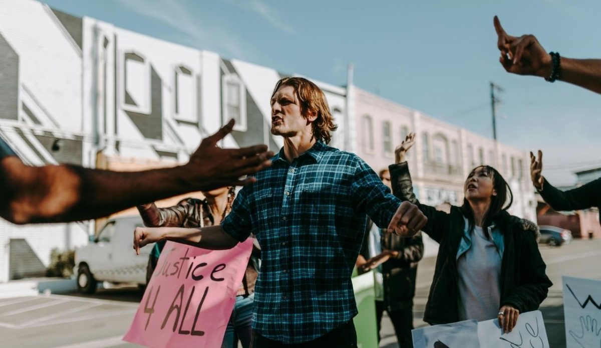 People Holding Protest Banners                        