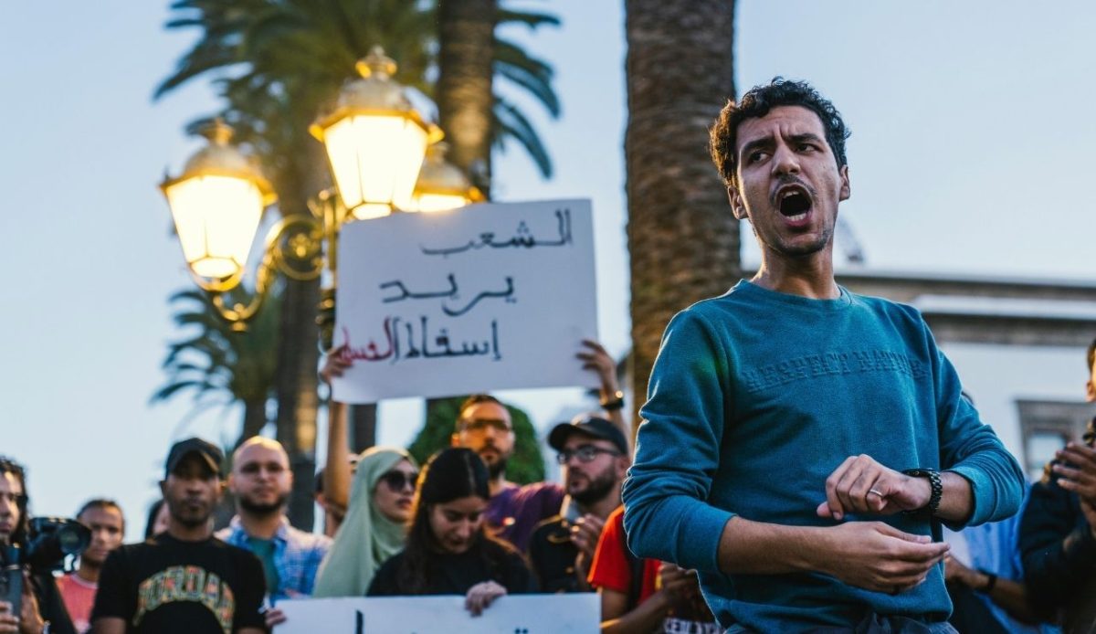 Passionate Protester Vocalizes at Public Demonstration                         