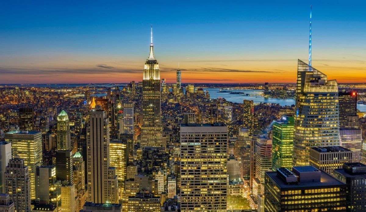 New York City skyline at sunset featuring the Empire State Building  