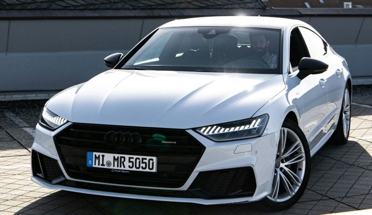 White Audi R 8 Parked on Pavement                                 