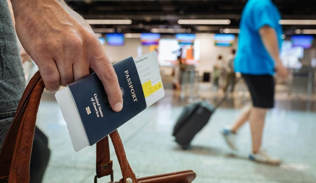 11 Japan Rules Americans Always Break 11 a passeneger with passport in his hand at airport