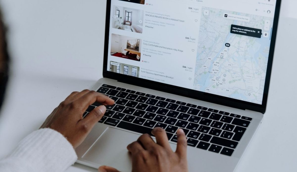 a person is searching for hotel accomodation (room) online                      