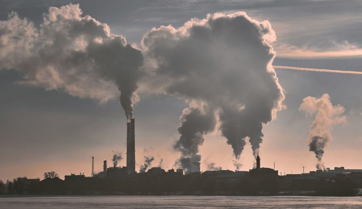 smoke coming out of factories representing air pollution                               