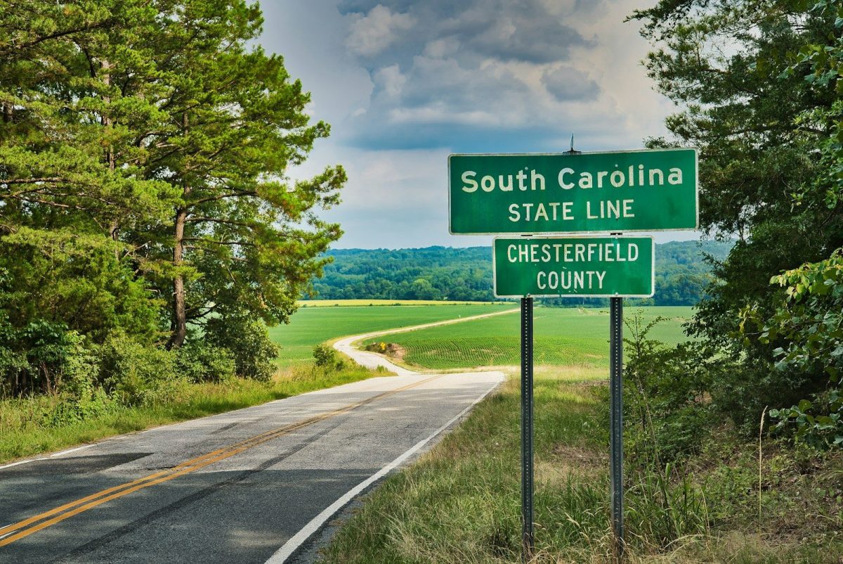 8 of America's Oldest Roadside Stops You Can Still See 6 South Caroline State Line street sign
