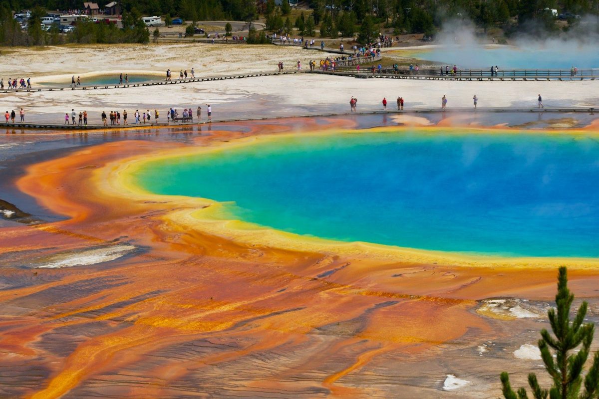 9 Ways a Yellowstone Eruption Could Change Travel in the U.S. 2 people on beach shore during daytime