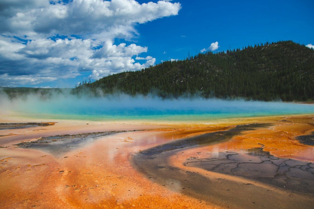 9 Ways a Yellowstone Eruption Could Change Travel in the U.S. 7 a large body of water surrounded by a forest