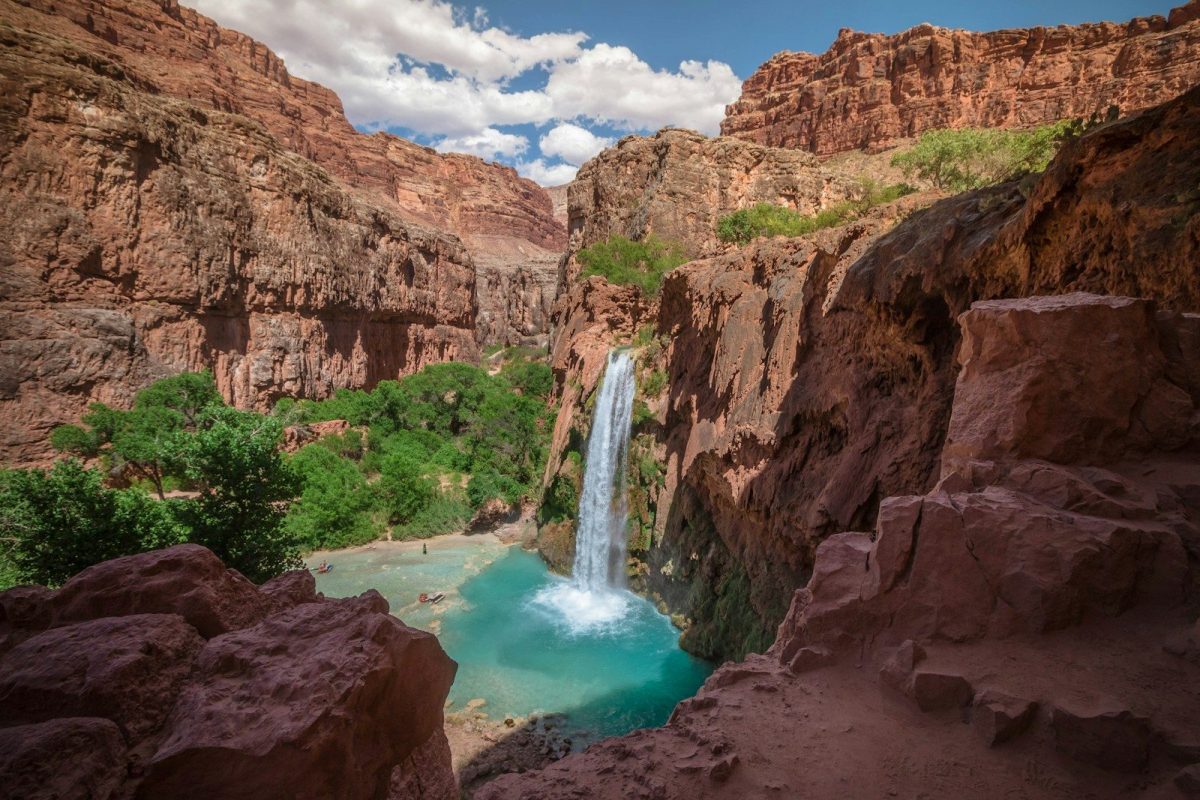 9 Important Things to Know Before Visiting the Grand Canyon 2 Havasupai Falls in Arizona under white and blue sky