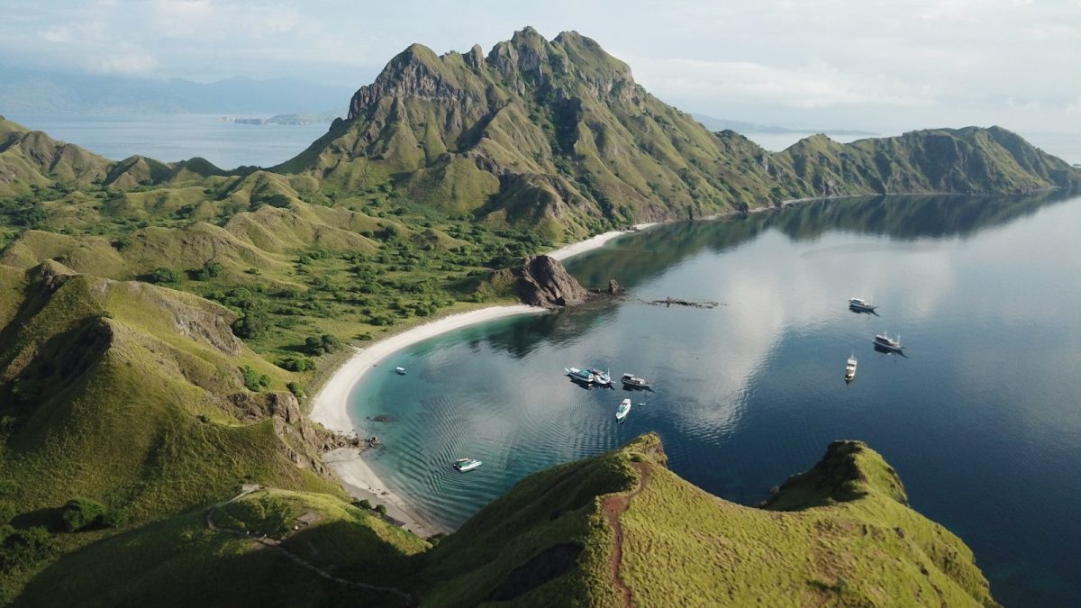 9 Dream Destinations for Ocean Life Enthusiasts 7 a body of water surrounded by mountains