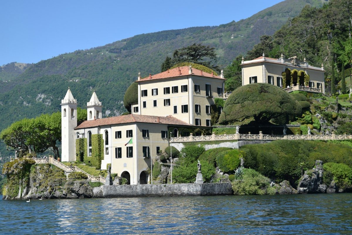 9 Beautiful Lakeside Homes Around the World Worth Seeing 1 white and brown concrete building near body of water during daytime