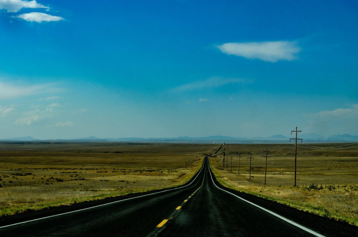 8 of America's Oldest Roadside Stops You Can Still See 5 black asphalt road between brown grass field under blue sky during daytime