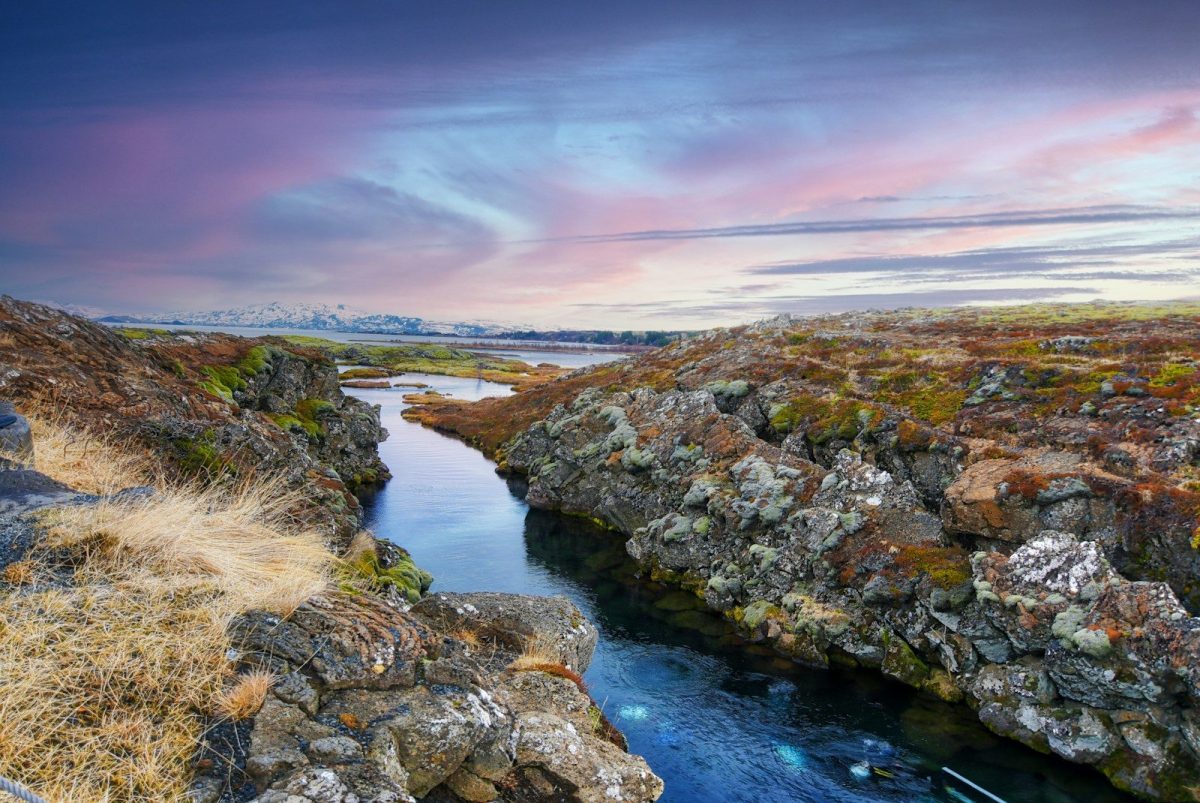 9 Dream Destinations for Ocean Life Enthusiasts 2 body of water between green and brown mountain under blue sky during daytime