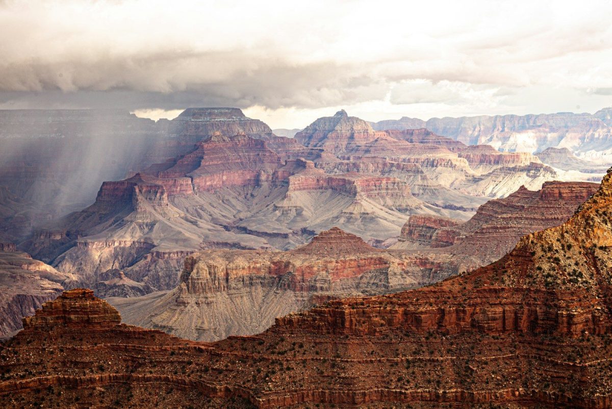 9 Important Things to Know Before Visiting the Grand Canyon 9 the sun shines through the clouds over the grand canyon