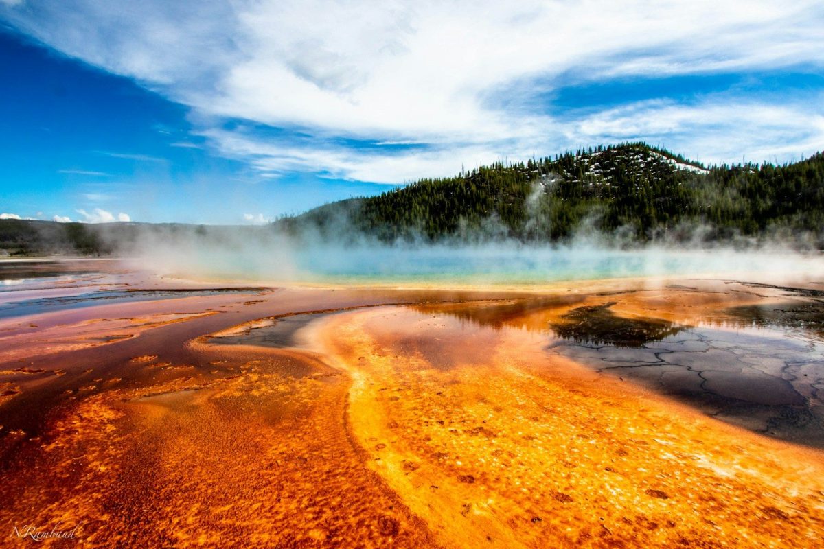 9 Ways a Yellowstone Eruption Could Change Travel in the U.S. 1 geyser within mountain range during daytime