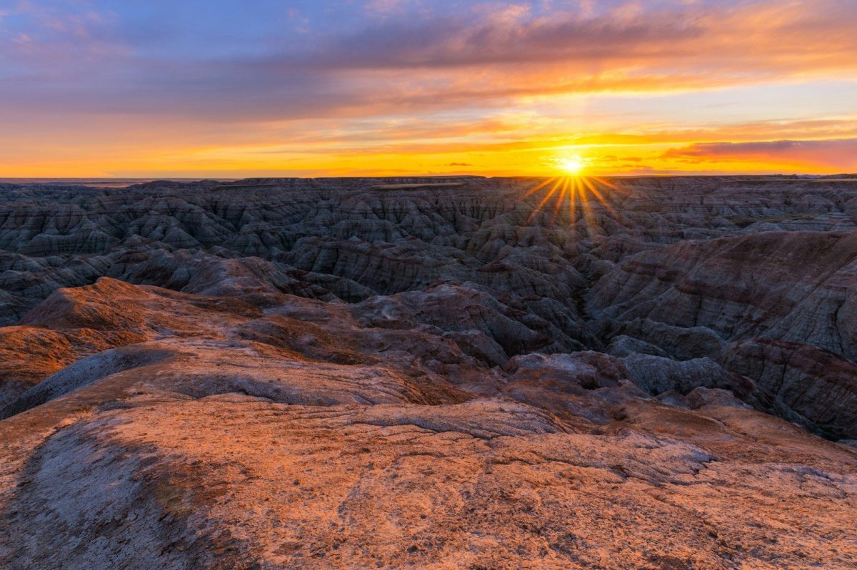 8 of America's Oldest Roadside Stops You Can Still See 9 brown rocky mountain during sunset