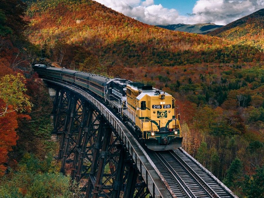 yellow train on rail tracks during daytime