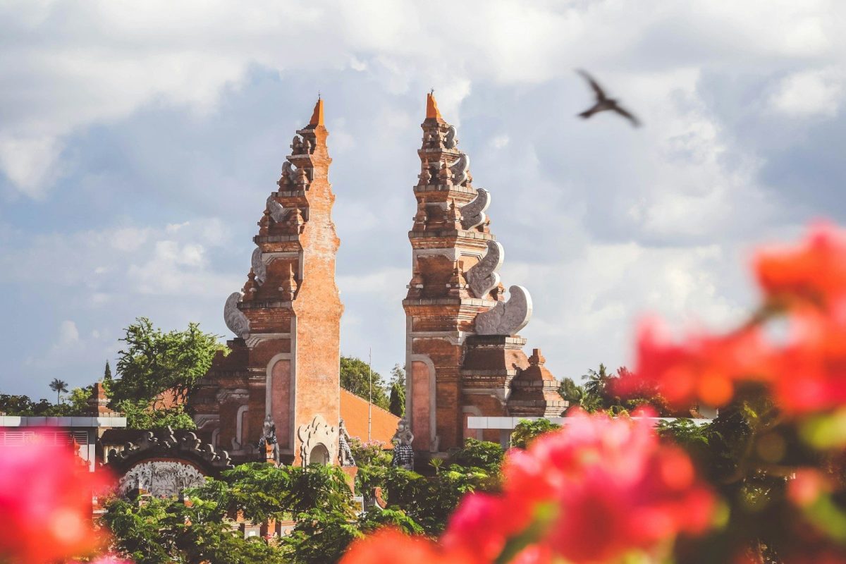 10 Countries Where Shower Habits May Surprise Travelers 5 bird flying over brown concrete gate during daytime