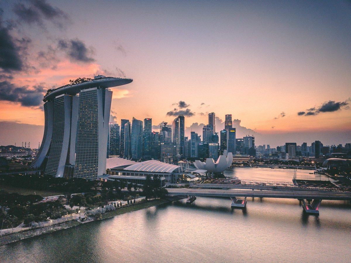 10 Amazing Long Train Trips Around the World for Travelers 10 a large body of water with a city in the background